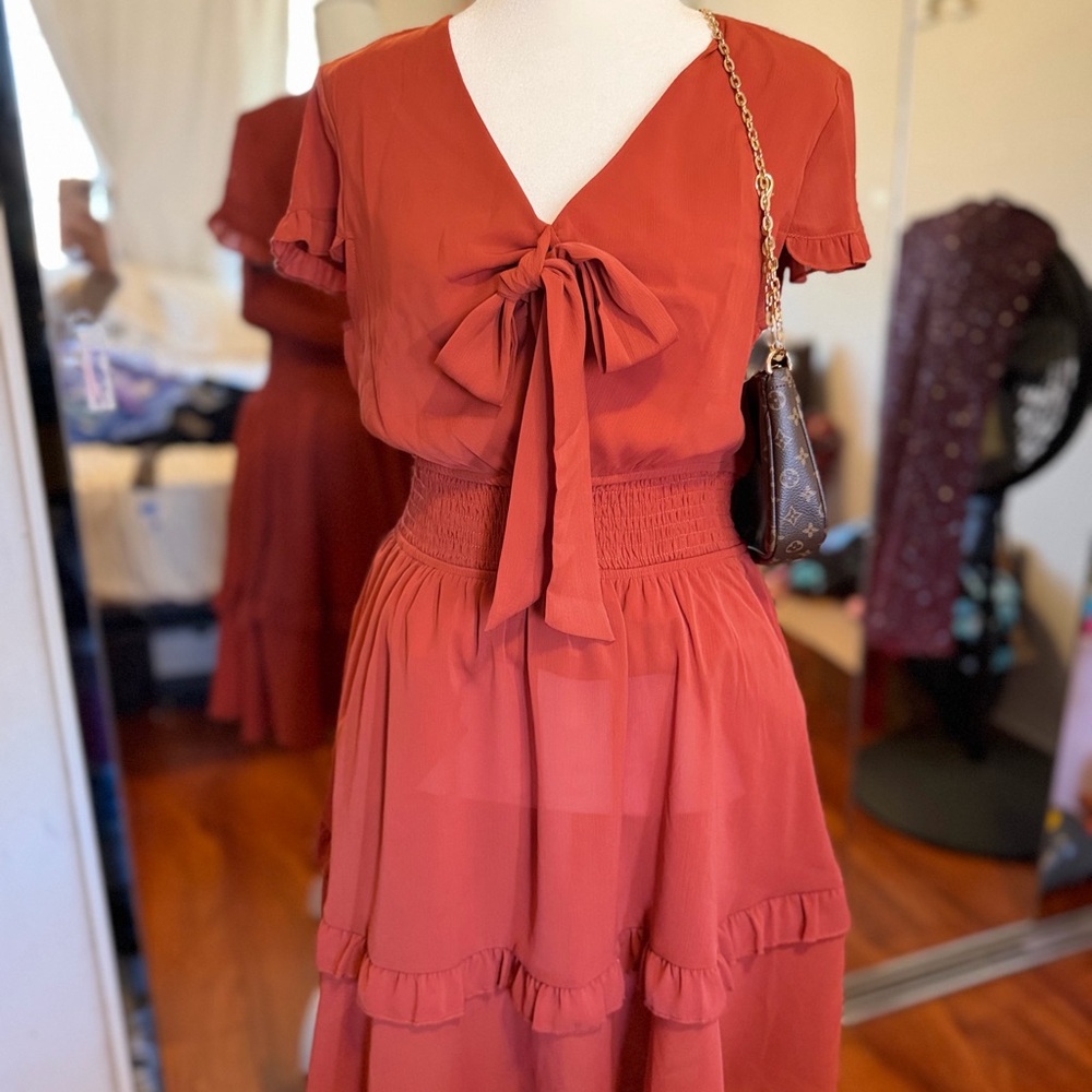 Elegant Red Dress with Bow Detail